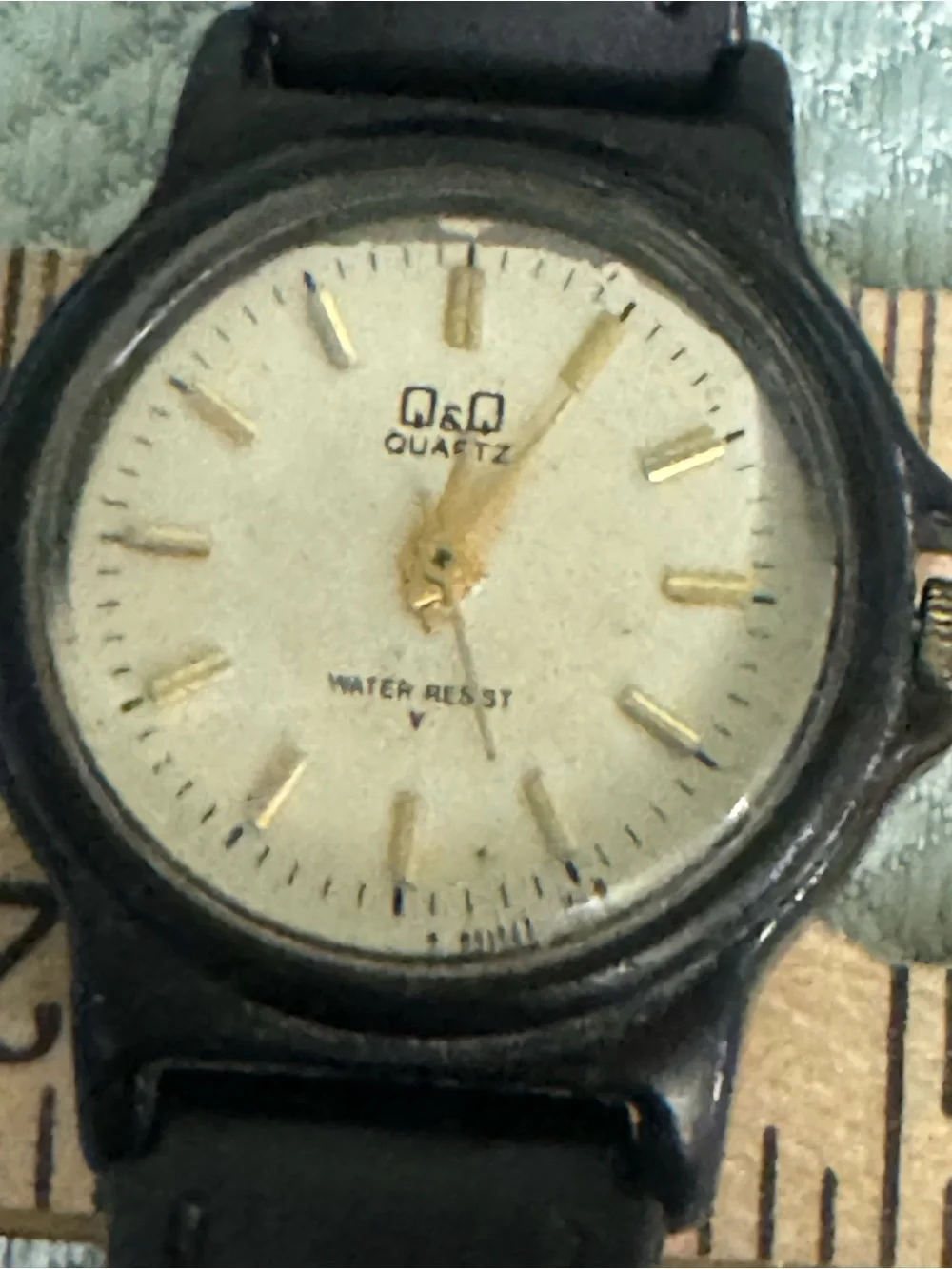 Q&Q Black and Gold Analog Quartz Watch for Everyday Wear